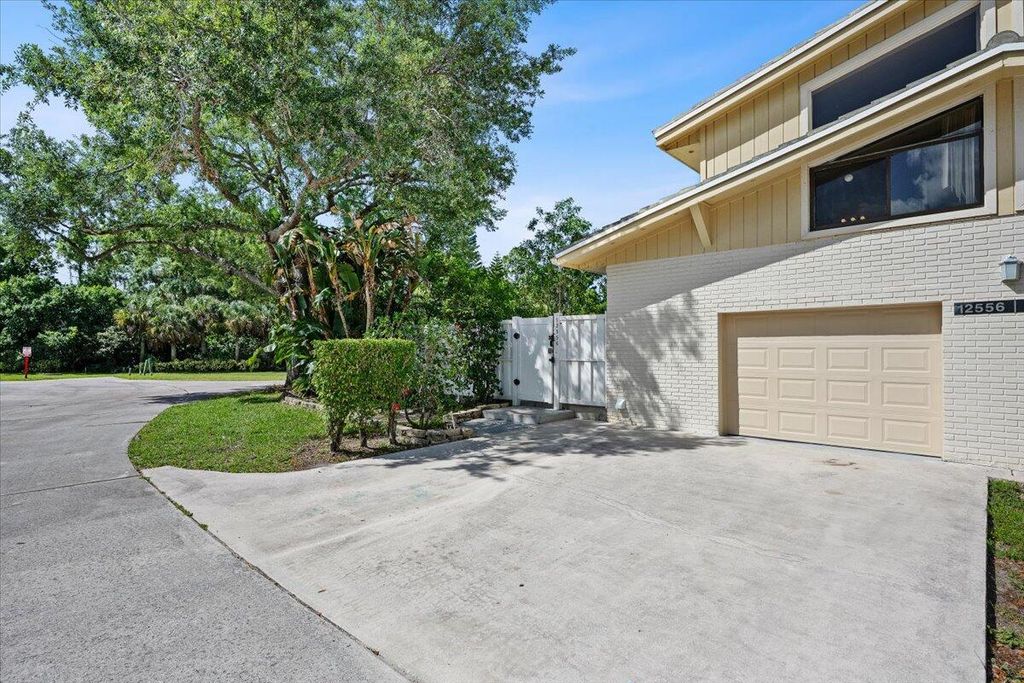 Photo of 12556 Woodmill Drive, Palm Beach Gardens, FL 33418 (MLS # B26019940)