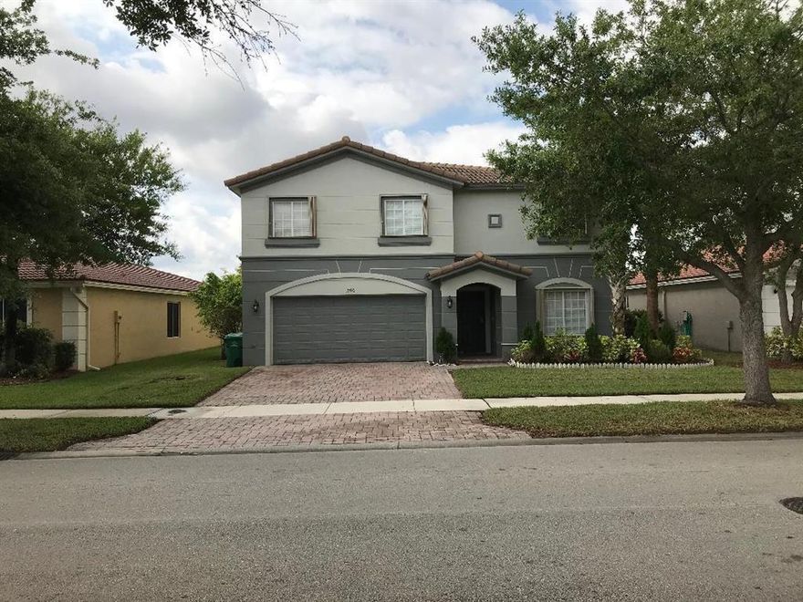 one of the largest floor plans in Portofino Isles. a true 5 bedroom home with a fenced in back yard. outside of home is freshly painted. with accordion shutters. kitchen boasts stainless steel appliances with granite counter tops. newly installed AC inside & outside units,  the master bath has a garden tub, separate shower and Master Bedroom has a sitting room that can also be used for a den.