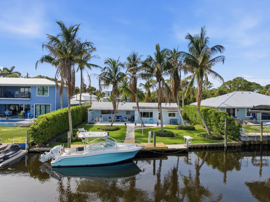 Photo of 1719 SW DYER POINT Road, Palm City, FL 34990 (MLS # B26064990)