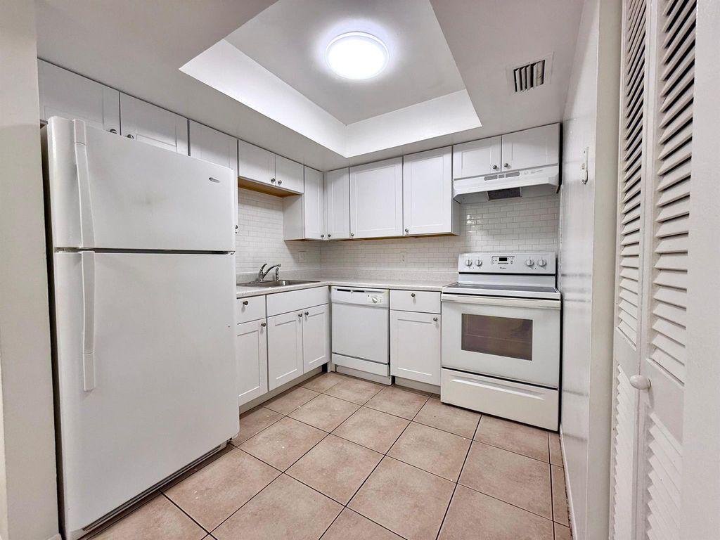 Photo of 3096 Collin Drive #C, West Palm Beach, FL 33406 (MLS # R11077554)