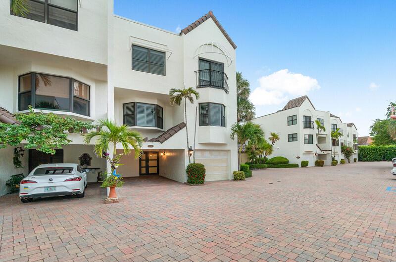 Charming 3 story corner TH with private elevator overlooking Pelican Lake & steps to the beach. This 2,680 SF TH features 3BR /3.5 BA ; 1 car garage + 1car CP. Completely redone to the highest standards.Excellent finishes & designer furnishings; chefs kitchen, formal dining, large rooms, light & bright; 3 balconies + private 1st fl patio for BBQ's & outdoor entertaining. Cote de la Mer is a charming European styled development of 39 town houses nestled between Pelican Lake & the Atlantic Ocean with a center courtyard whichs hosts a heated pool,hot-tub,recre room with restrooms & exercise equipment. Privated gated entry leads to the prestine waters of the Atlantic ocean with private beach access. 20 minutes to airport, walk to restaurans, shopping. Enjoy all Juno Beach has to offer.