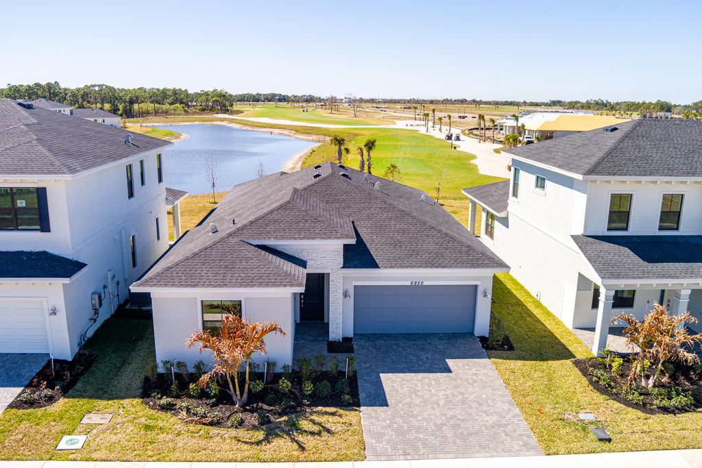 Photo of 6850 NW Kestrel Lane, Port Saint Lucie, FL 34987 (MLS # R11158589)