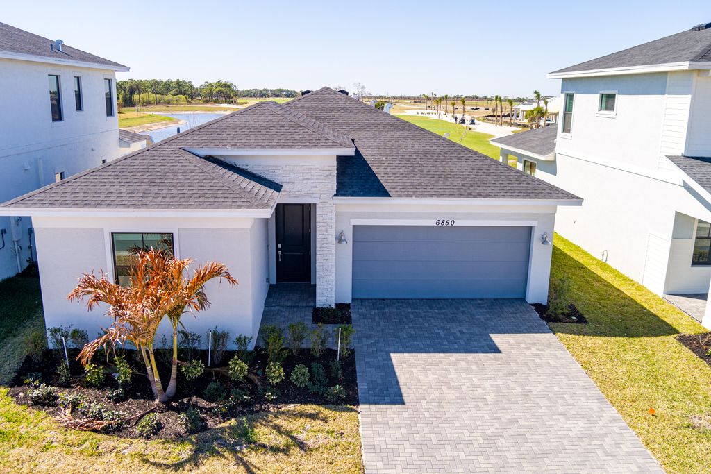 Photo of 6850 NW Kestrel Lane, Port Saint Lucie, FL 34987 (MLS # R11158589)