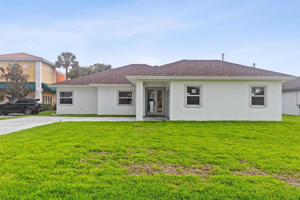 Photo of 4037 SW Port St Lucie Boulevard, Port Saint Lucie, FL 34953 (MLS # R11097201)