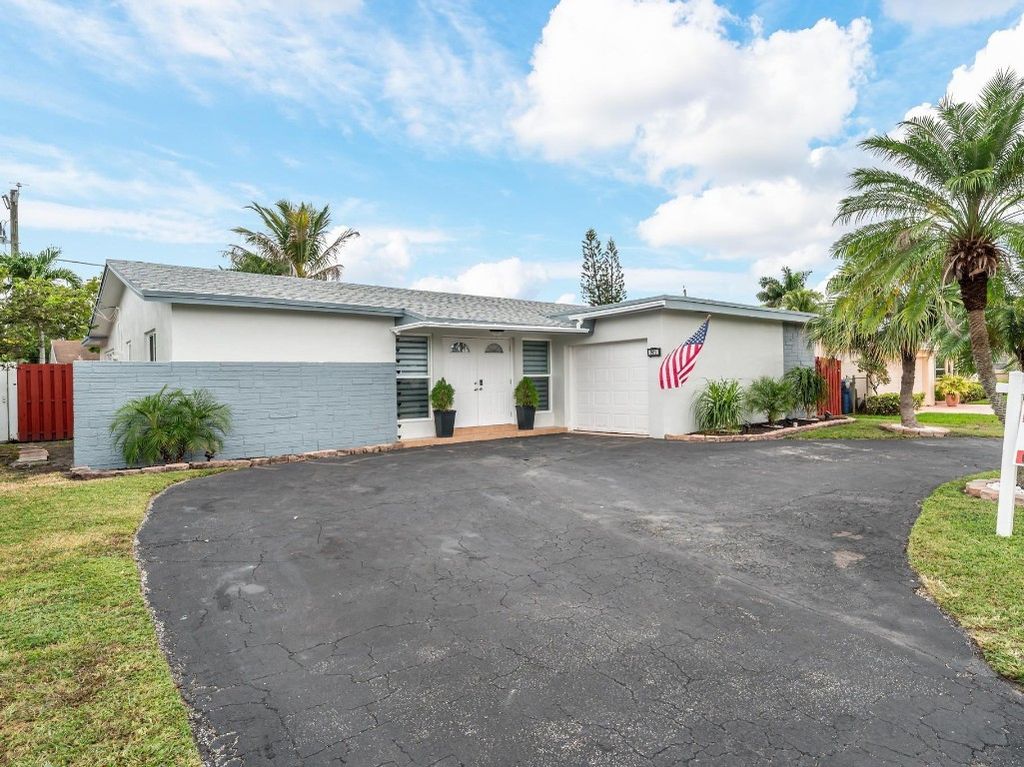 Photo of 9511 NW 21st Manor, Sunrise, FL 33322 (MLS # F10530844)