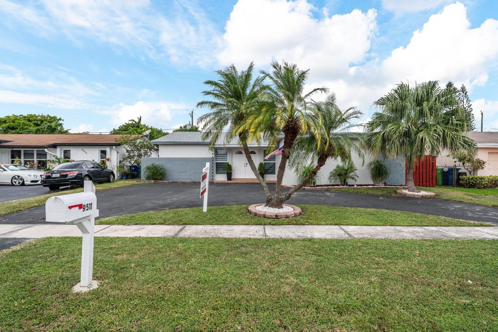 Photo of 9511 NW 21st Mnr, Sunrise, FL 33322 (MLS # F10530844)