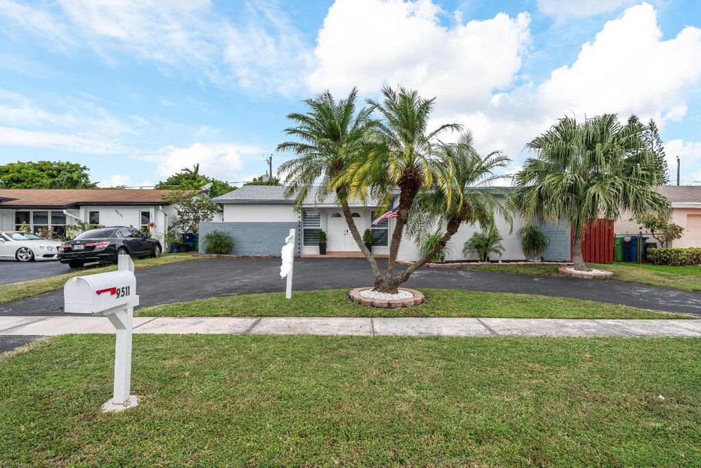 Photo of 9511 NW 21st Manor, Sunrise, FL 33322 (MLS # F10530844)