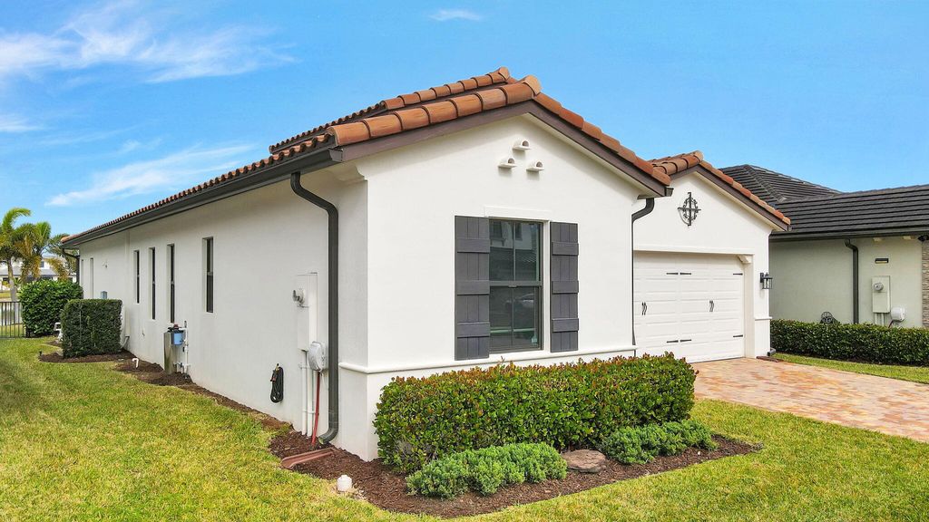 Photo of 8756 Grand Prix Lane, Boynton Beach, FL 33472 (MLS # R11052980)