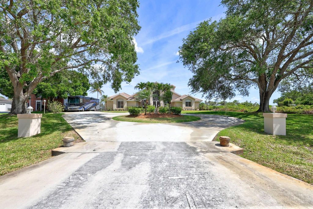 Photo of 757 SE Hidden River Drive, Port Saint Lucie, FL 34983 (MLS # R10878877)