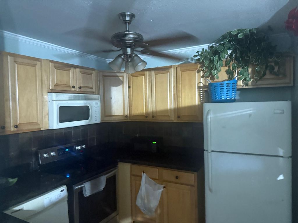 Photo of 8601 Pluto Terrace, West Palm Beach, FL 33403 (MLS # R11120112)