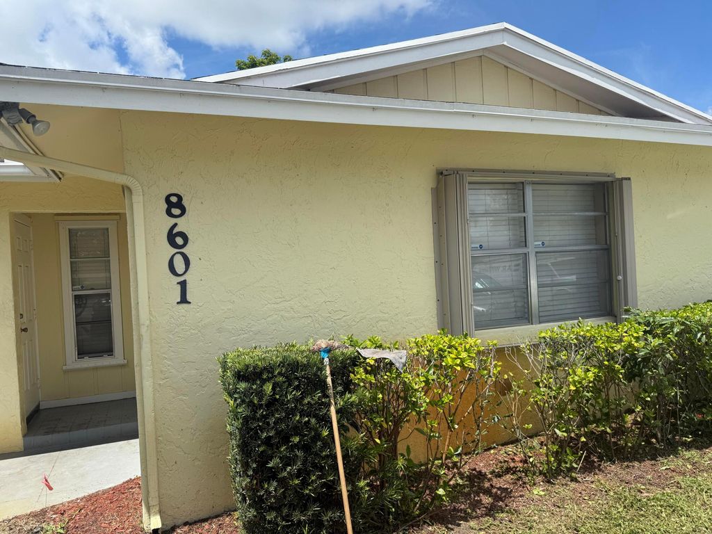 Photo of 8601 Pluto Terrace, West Palm Beach, FL 33403 (MLS # R11120112)
