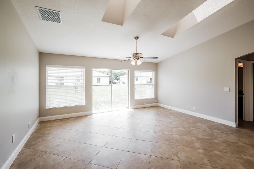 Photo of 4634 SW Tacoma Street, Port Saint Lucie, FL 34953 (MLS # R11117719)