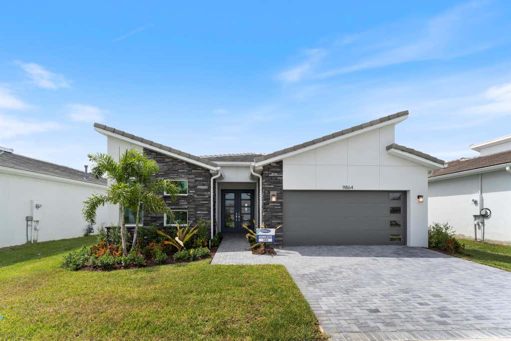 Photo of 9864 SW Isabelline Drive, Port St Lucie, FL 34987 (MLS # R10912185)