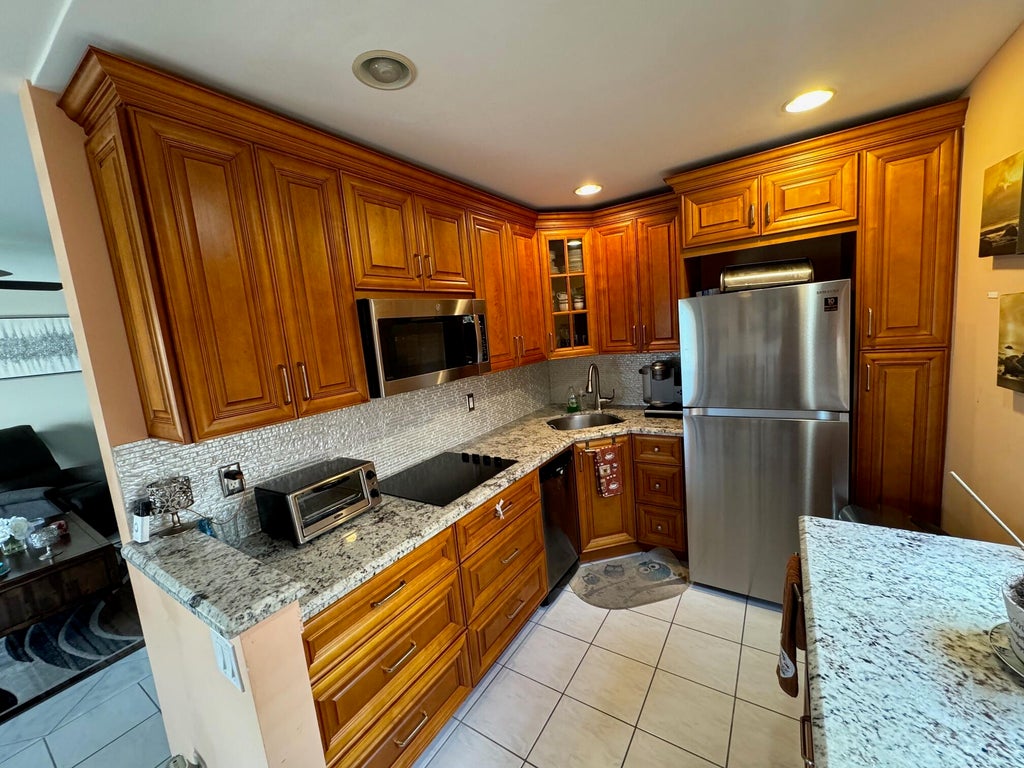 Photo of 669 Burgundy N, Delray Beach, FL 33484 (MLS # B26053488)