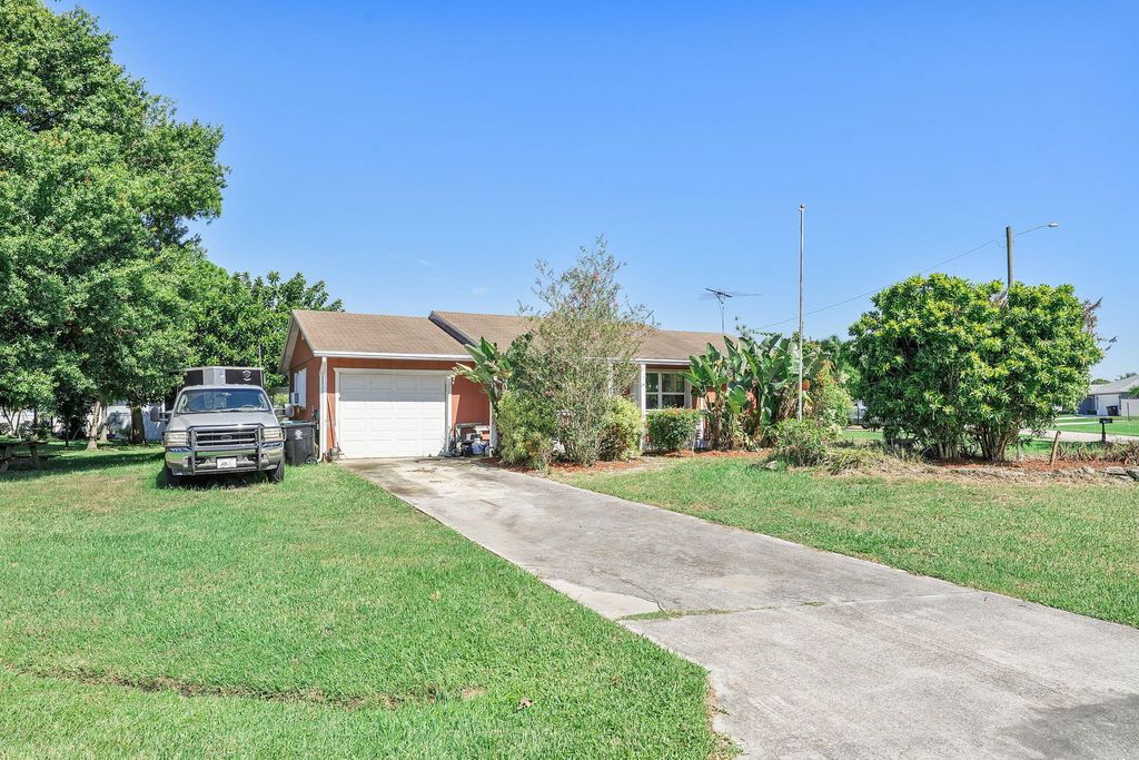 Photo of 181 SW Christmas Terrace, Port Saint Lucie, FL 34984 (MLS # R11113829)