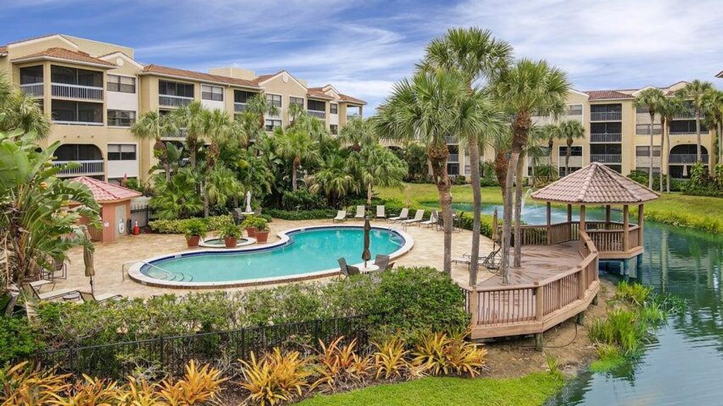 Photo of 400 Uno Lago Drive #304, Juno Beach, FL 33408 (MLS # R10941138)