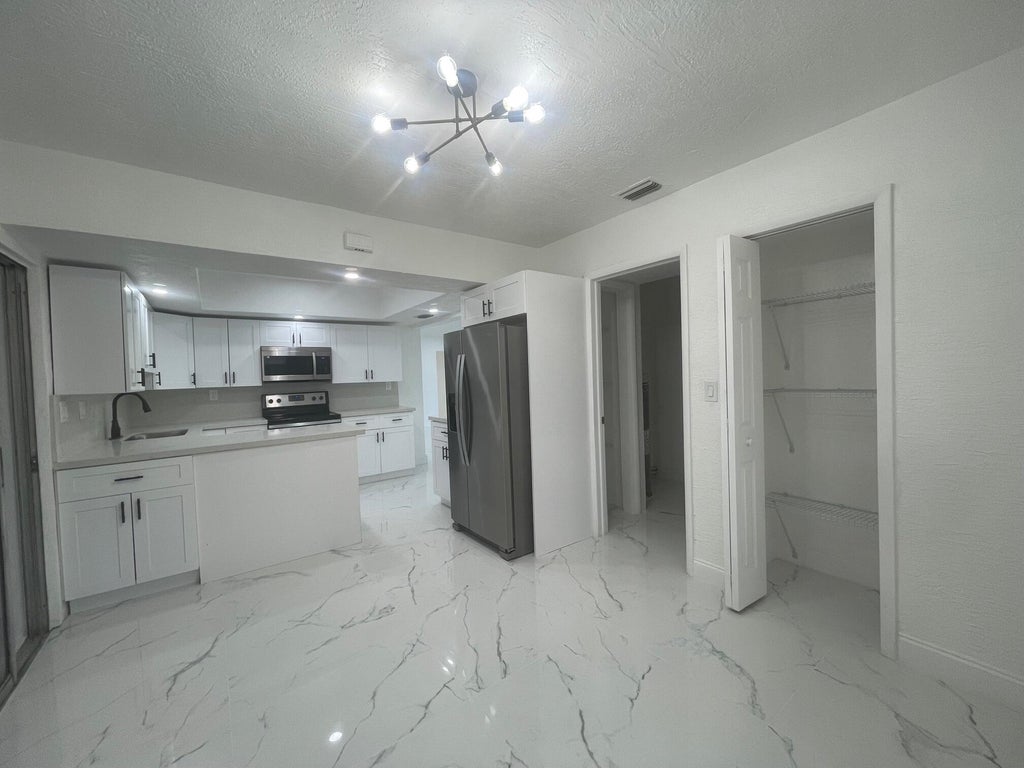 Photo of 3290 NW 39TH Street, Lauderdale Lakes, FL 33309 (MLS # B26069967)