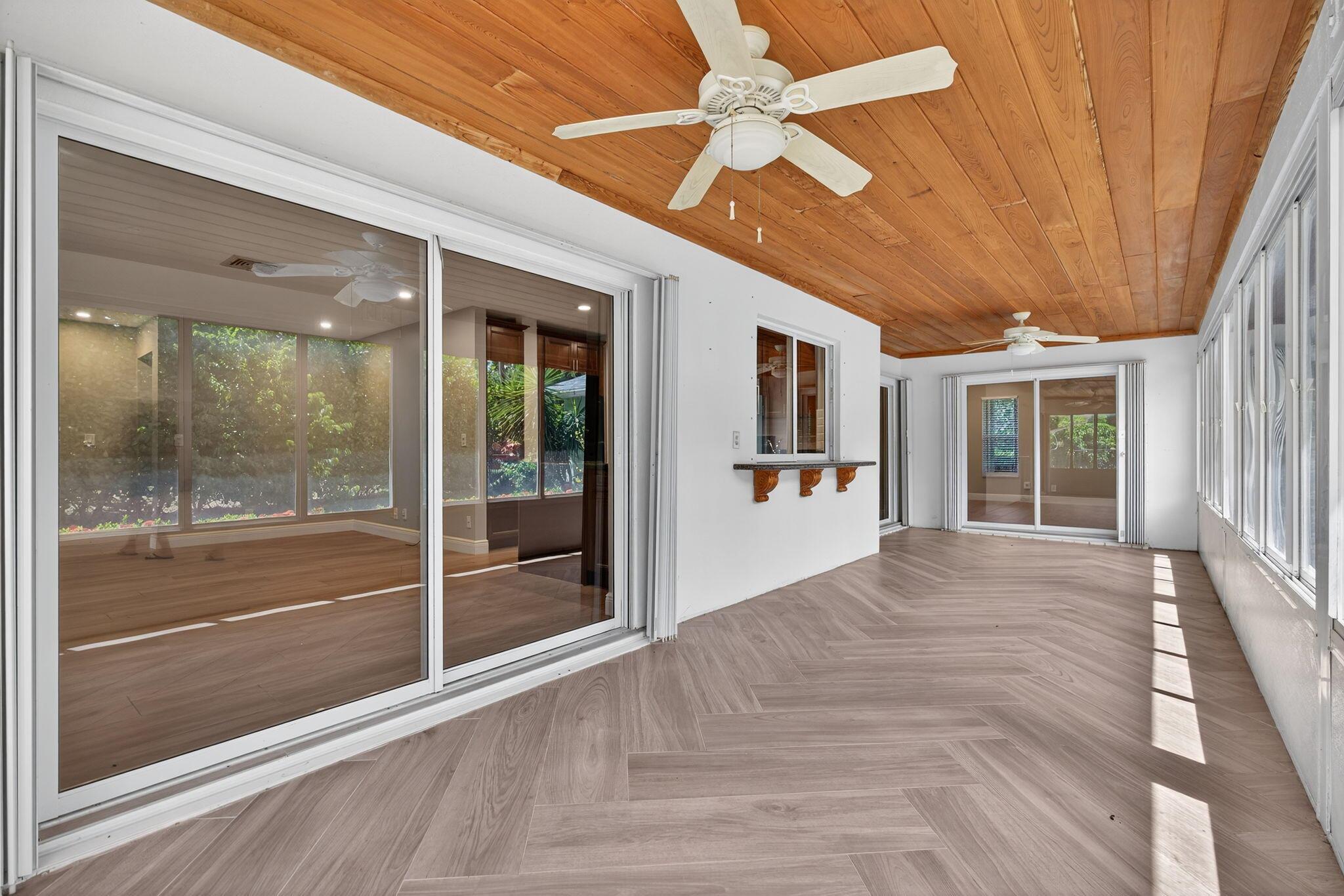 Welcome home to the Village of North Palm Beach! Situated on a large corner lot, this spacious 4-bedroom, 3-bath home includes two ensuite master bedrooms and a thoughtfully designed floor plan with living, dining, and family rooms. Enjoy a large enclosed lanai that extends the entertaining space off the kitchen, dining, and family rooms. Additional features include an interior laundry room with sink, accordion shutters, and a fully fenced yard with mature Clusia hedge for privacy. The oversized 2-car garage and circular driveway offer ample parking.Offered unfurnished for annual rental at $5,500/month.The Village of NPB is a golf cart-friendly coastal community conveniently located near Anchorage Park, the North Palm Beach Country Club, shopping, dining, and beautiful local beaches.