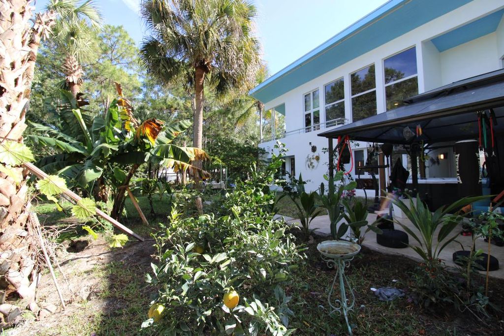 Photo of 930 Rambling Drive Circle, Wellington, FL 33414 (MLS # R11156478)