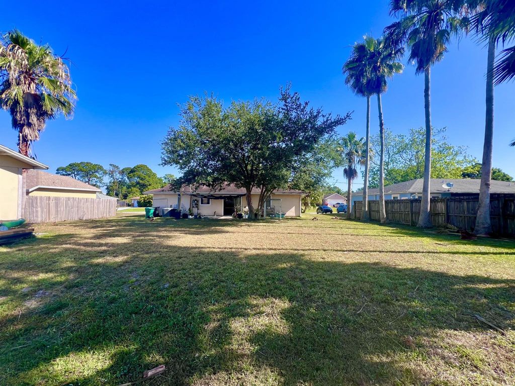 Photo of 1232 SW Sudder Avenue, Port Saint Lucie, FL 34953 (MLS # R10977756)
