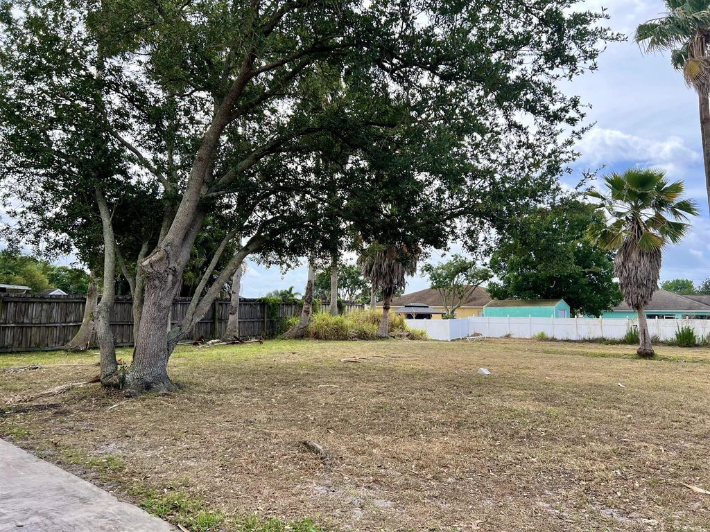 Photo of 1232 SW Sudder Avenue, Port Saint Lucie, FL 34953 (MLS # R10977756)