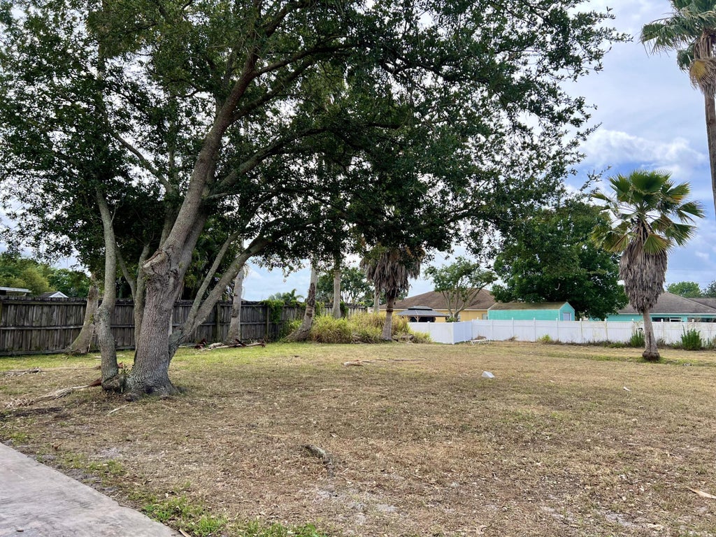Photo of 1232 SW Sudder Avenue, Port Saint Lucie, FL 34953 (MLS # R10977756)