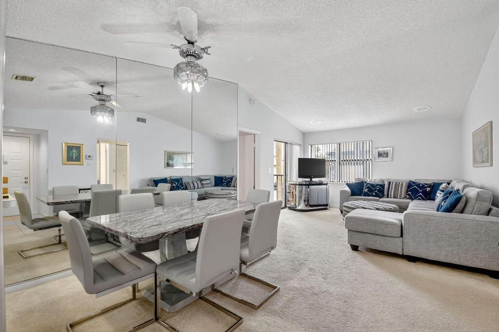 Photo of 7657 Tahiti Lane #202, Lake Worth, FL 33467 (MLS # R11141484)