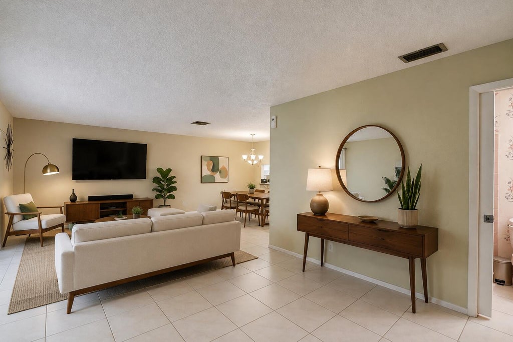 Photo of 5780 FERNLEY Drive W #144, West Palm Beach, FL 33415 (MLS # B26064896)