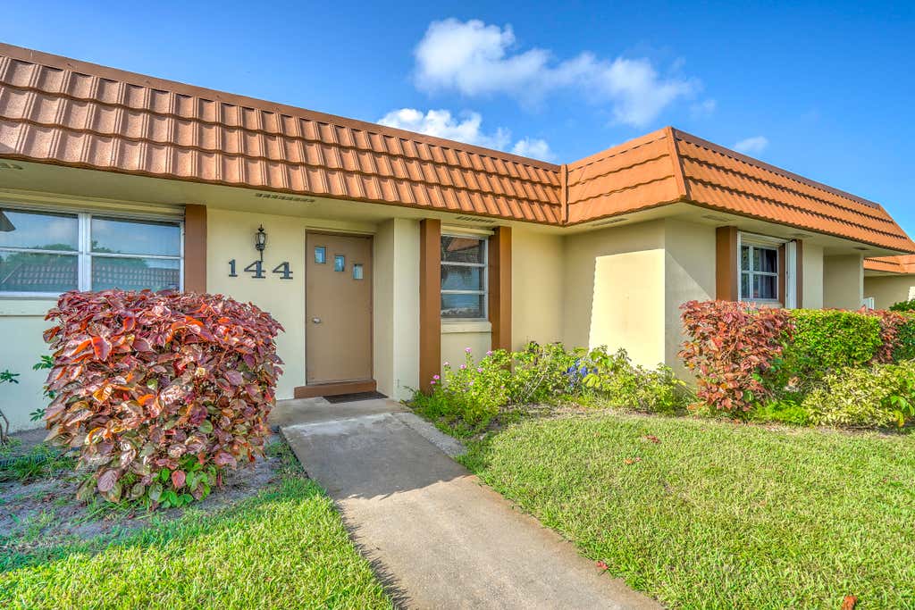 Photo of 5780 FERNLEY Drive W #144, West Palm Beach, FL 33415 (MLS # B26064896)