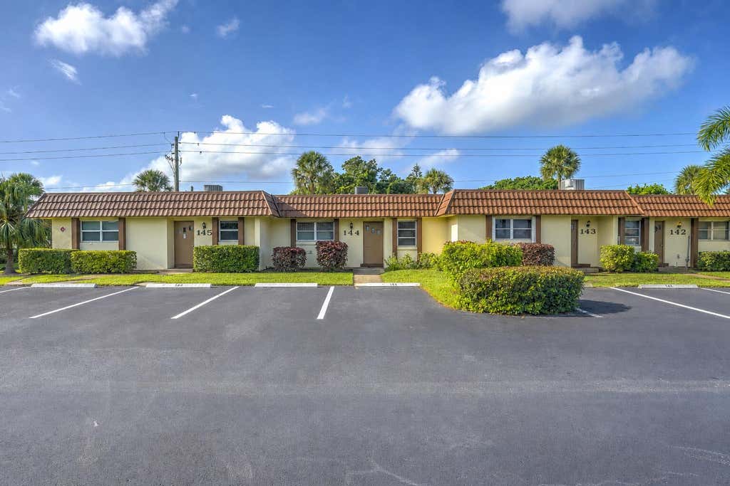 Photo of 5780 FERNLEY Drive W #144, West Palm Beach, FL 33415 (MLS # B26064896)