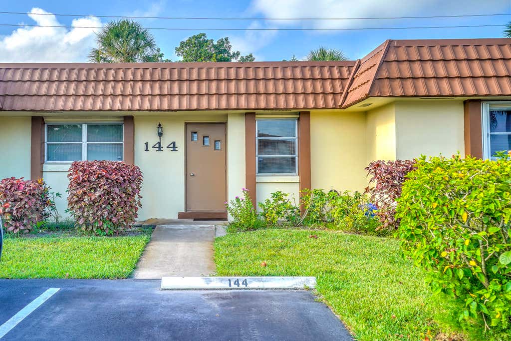 Photo of 5780 FERNLEY Drive W #144, West Palm Beach, FL 33415 (MLS # B26064896)