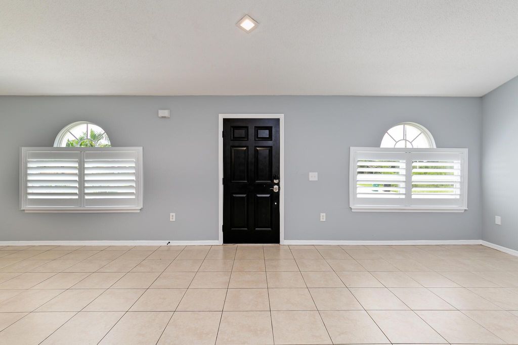 Photo of 4530 SW Yamada Drive, Port Saint Lucie, FL 34953 (MLS # R11049491)