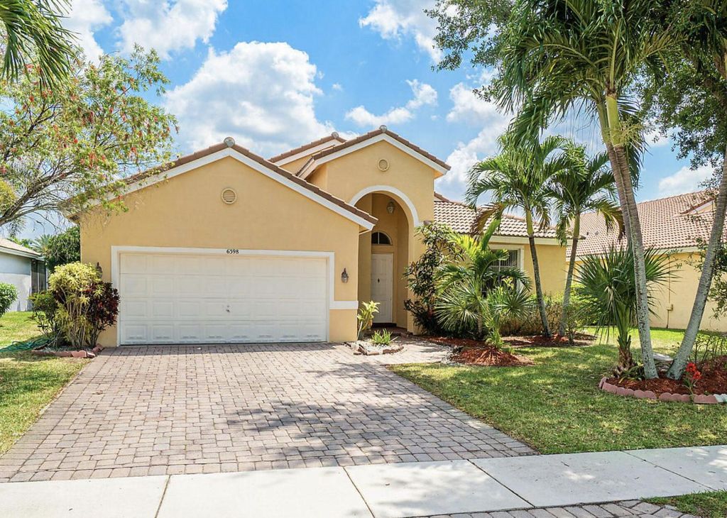 Photo of 6398 C Durham Drive Dr, Lake Worth Beach, FL 33467 (MLS # R10779734)