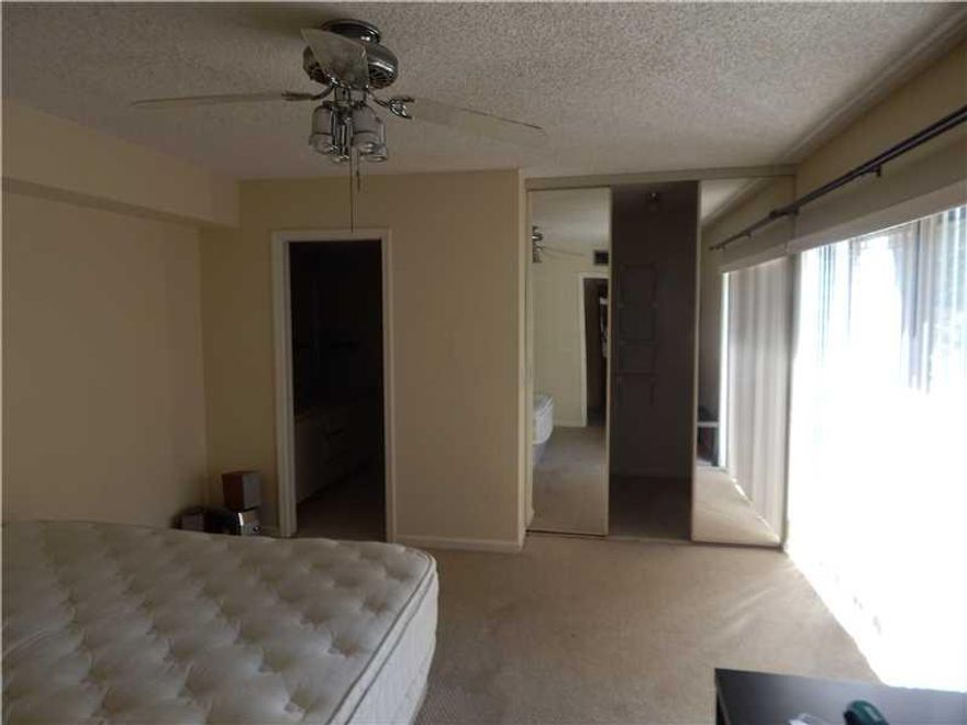 Wonderful 2/2.5 townhouse in Waterford courtyards in Jacaranda.  Open floor plan with sliders open to fenced in porch.  The master bedroom is big with walk in closet. second bedroom good size also. Central vacuum in the unit.  Association fee covers a lo t of things This is not a short sale or foreclosure.  easy to show.