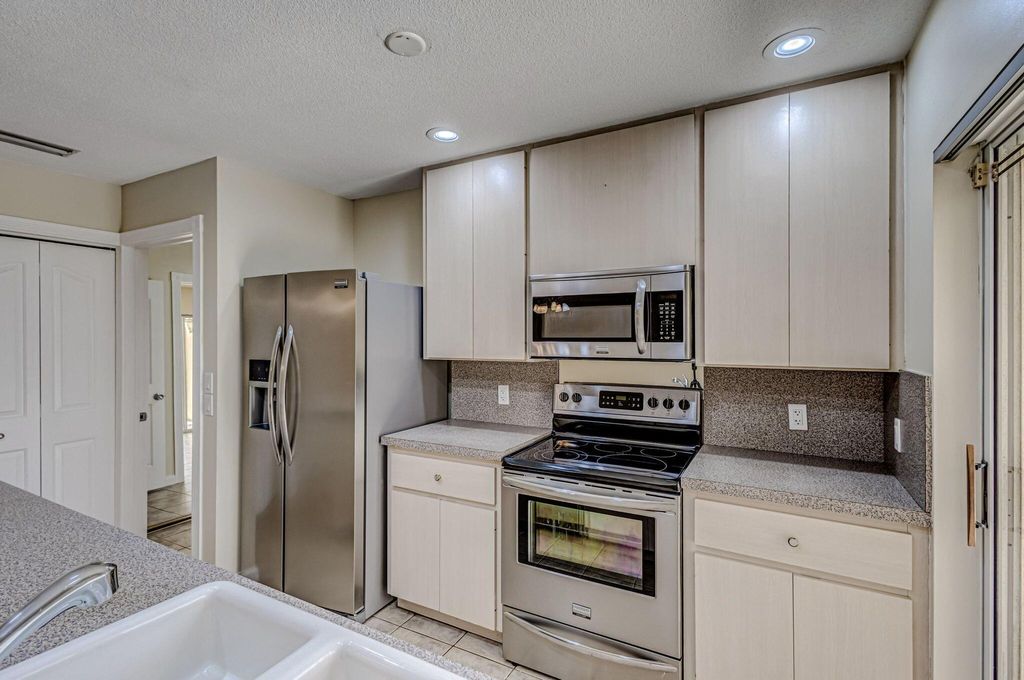 Photo of 9165 Sun Terrace Circle #D, West Palm Beach, FL 33403 (MLS # R11091944)