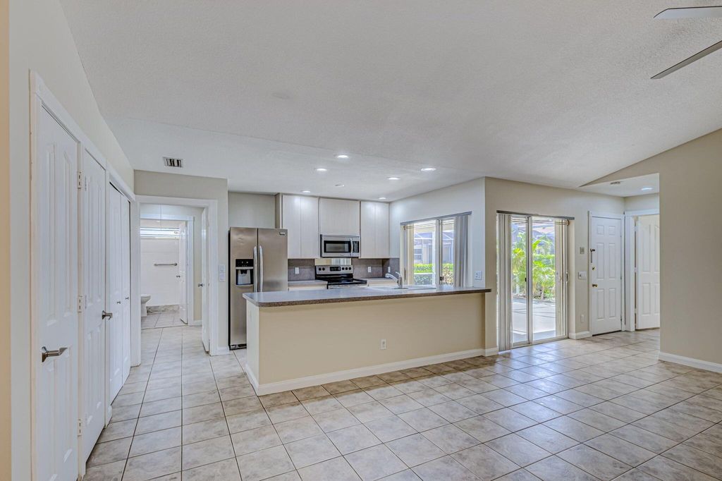 Photo of 9165 Sun Terrace Circle #D, West Palm Beach, FL 33403 (MLS # R11091944)