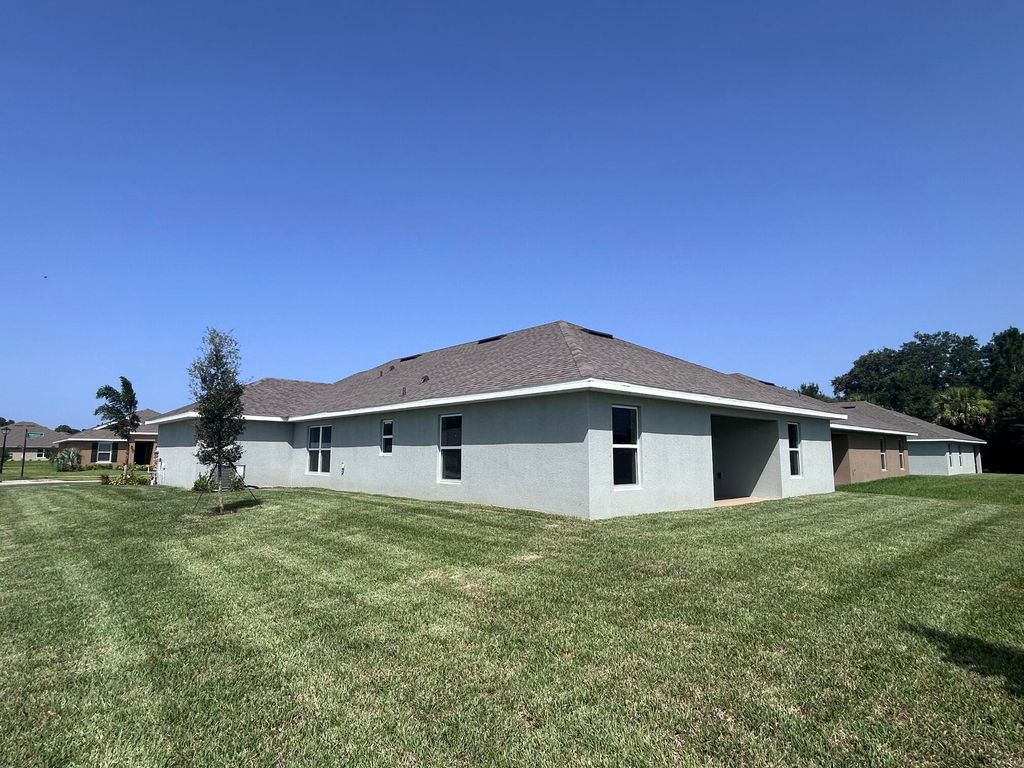 Photo of 5747 Waterstone Boulevard, Fort Pierce, FL 34951 (MLS # B26050641)
