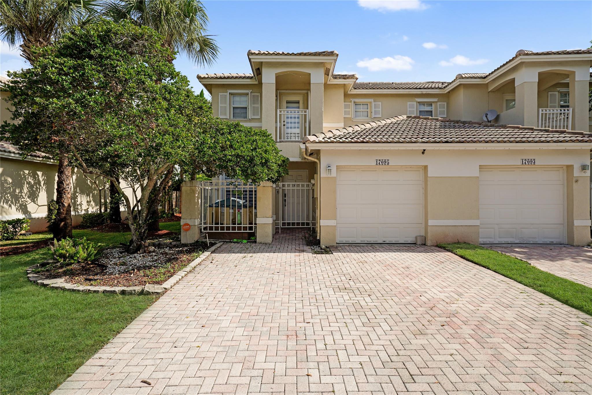 Stunning 3BD 2.5BA corner townhouse in Pembroke Pines. This Hampton model home features a spacious layout & large windows with tons of natural light. Attached 1-car garage + paved driveway easily accommodate 3 cars. Beautifully updated with a bright white Galley kitchen & equipped with black stainless steel appliances. The fenced patio is a great space for gatherings. All 3 rooms are upstairs and the primary bedroom boasts a grand ensuite with dual sinks and tub/shower combo. Located in the gated and amenity-rich community of Pembroke Isles, residents here enjoy the luxury of 3 swimming pools, a clubhouse, basketball, racquetball and tennis courts, a fitness center, aerobics studio and so much more! NO HOA approval required! Cable & Fiber Optic internet included! Equal Housing Opportunity.
