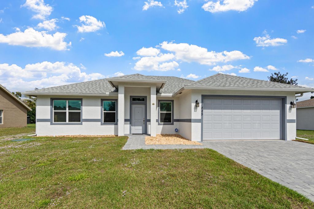 Photo of 1825 SW Effland Avenue, Port Saint Lucie, FL 34953 (MLS # R11124872)