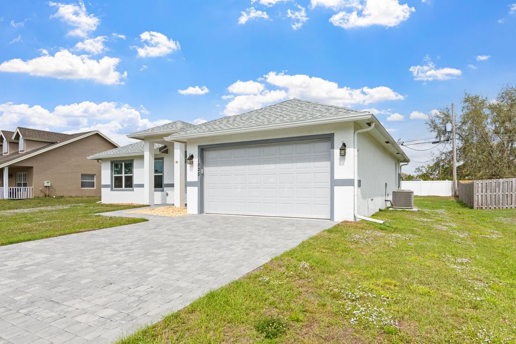 Photo of 1825 SW Effland Avenue, Port Saint Lucie, FL 34953 (MLS # R11124872)