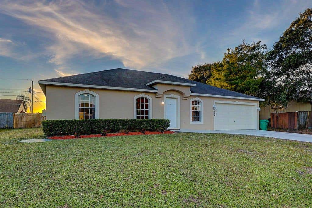 Photo of 2014 SW Hampshire Lane, Port Saint Lucie, FL 34953 (MLS # R10763231)