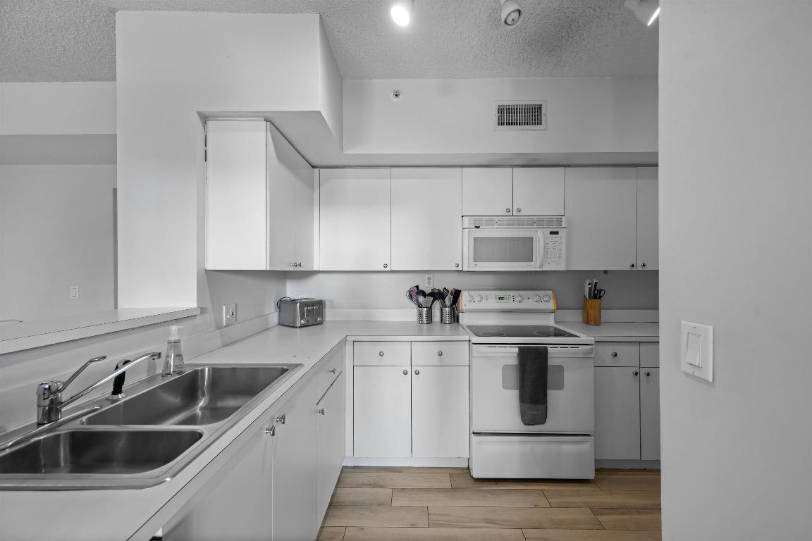 ST ANDREWS AT POLO CLUB CONDO - Residential