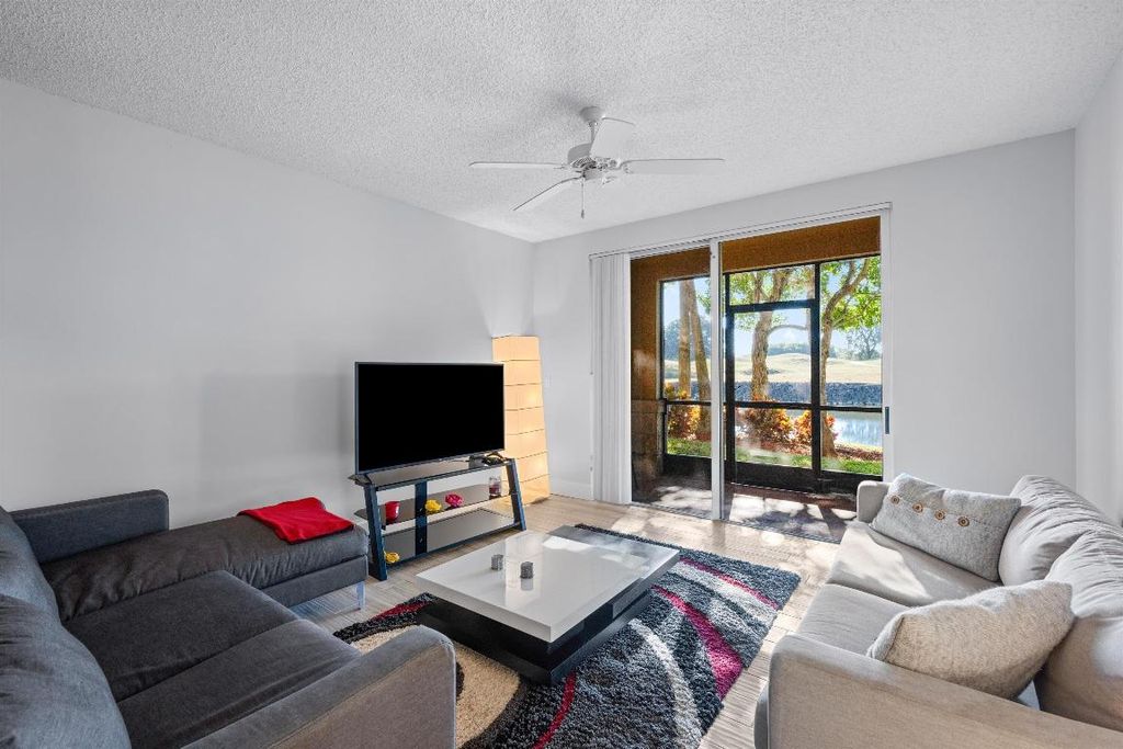 Photo of 11730 Saint Andrews Place #102, Wellington, FL 33414 (MLS # R11150390)