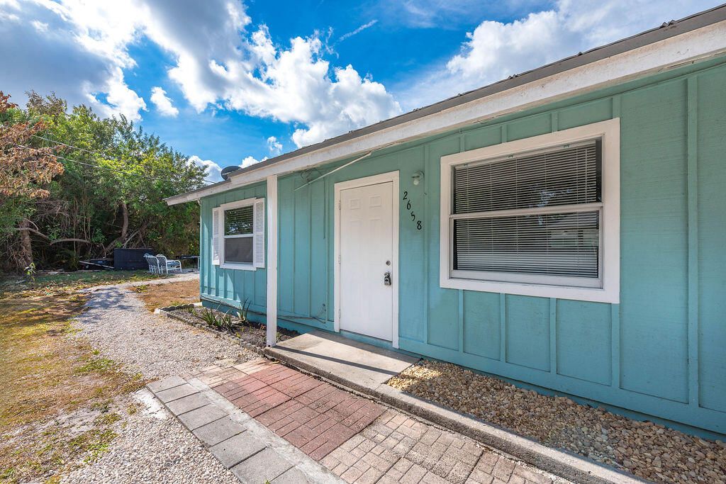 Photo of 2658 SE Amherst Street, Stuart, FL 34997 (MLS # R11160563)