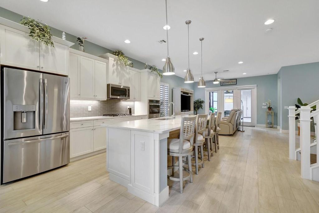 Photo of 1121 Faulkner Terrace, Palm Beach Gardens, FL 33418 (MLS # R10933824)