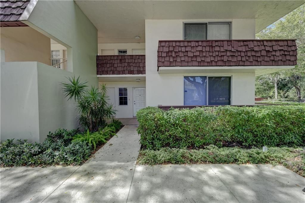 Photo of 3201 N Course Ln #107, Pompano Beach, FL 33069 (MLS # F10319860)