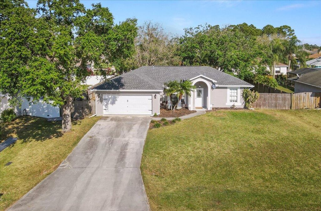 Photo of 4243 SW Utterback Street, Port Saint Lucie, FL 34953 (MLS # R10970626)