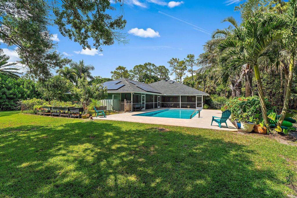 Photo of 10226 Trailwood Circle, Jupiter, FL 33478 (MLS # R11084342)