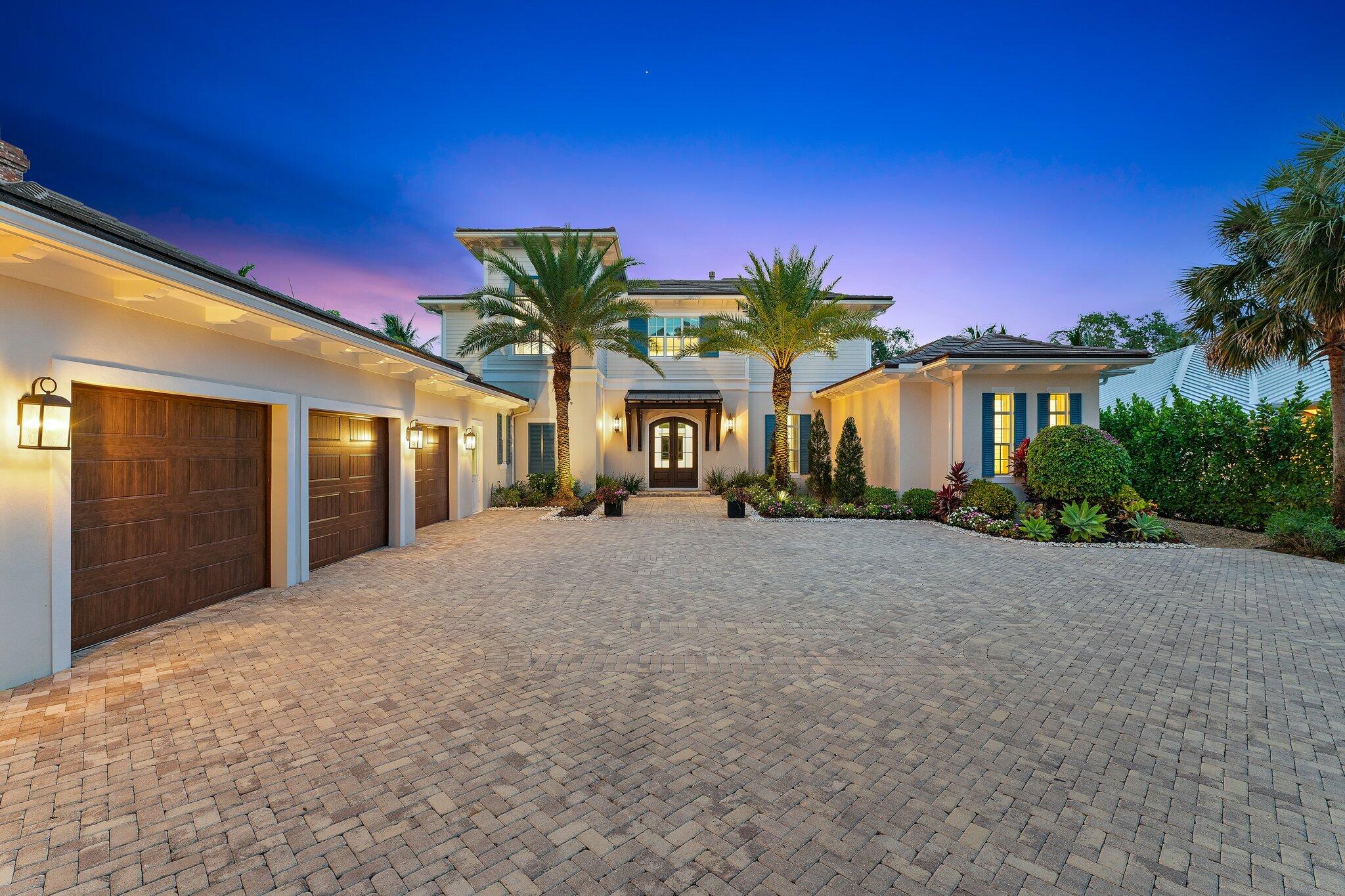 Don't miss this rare opportunity for a luxury Loxahatchee Riverfront estate for you and your family. Sitting on just under 1-acre of land with a majestic backyard Oak tree, this coastal home is move-in ready. Featuring high ceilings, the Master wing includes two oversized closets, his and her bath areas with deep soaking tub. The marble Fireplace anchors the formal living and dining rooms with coffered ceilings and French doors calling you to the waterfront patio and pool deck. The chef's kitchen has custom cabinetry, separate walk-in pantry, wine cooler and an island breakfast bar connecting to the family room. You and your guests can enjoy the covered patio with summer kitchen and cabana bath as a perfect party location next to the heated pool w/ spa. The den/5th BR with poolside French