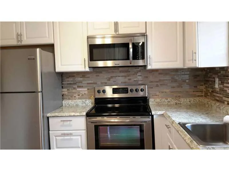 9441 Sunrise Lakes Blvd Unit 211  